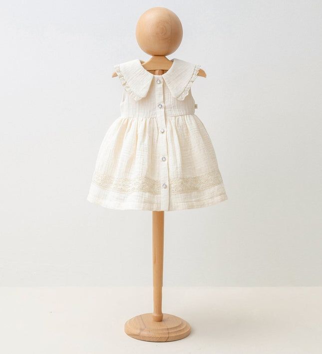 Бебешка муселинова рокля с къс ръкав - бежов